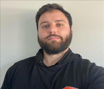 headshot of a man with a beard