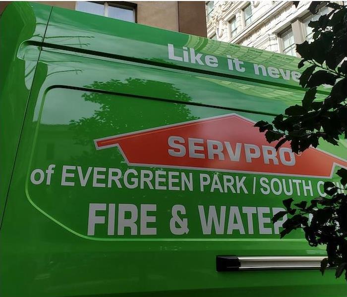 The side of a green SERVPRO van