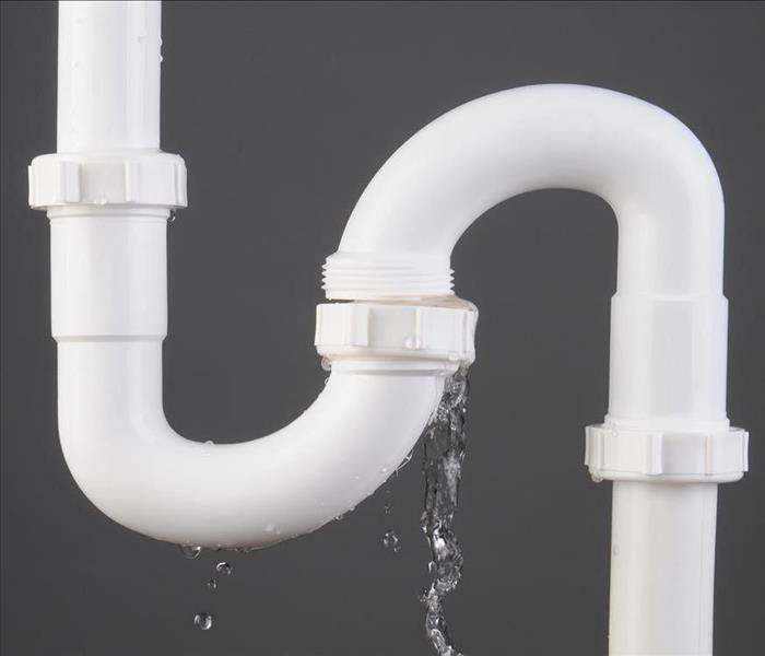 white PVC pipes leaking water
